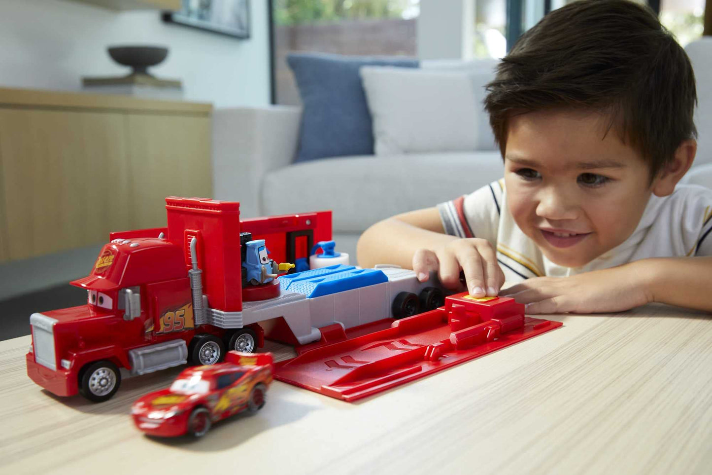 Mattel Disney and Pixar Cars Transforming Mack Playset, 2-in-1 Toy Truck & Tune-Up Station with Launcher, Lift & More, Movie-Inspired Graphics, Gift for Kids Ages 4 Years Old & Up